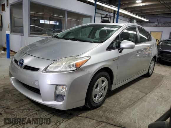 2011 Toyota Prius I z VIN JTDKN3DU7B5360218, wystawiony jako Copart lot #87124925 z przebiegiem 184 230 mil mil oraz Czysty tytuł • Clean title. Historia ofert i sprzedaży dostępna na DreamBid. Obrazek 1.