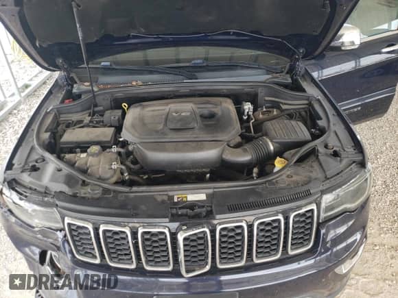 2018 Jeep Grand Cherokee Sterling z VIN 1C4RJFBG8JC127306, wystawiony jako Copart lot #69199235 z przebiegiem 112 091 mil mil oraz Szkoda całkowita • Salvage title. Historia ofert i sprzedaży dostępna na DreamBid. Obrazek 12.