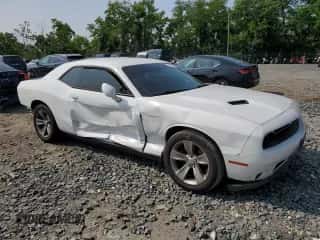 2016 Dodge Challenger SXT with VIN 2C3CDZAG0GH336615, listed as a Copart auction lot 60410045 with 122,101 mi miles and Salvage title. Bid and sale history available at DreamBid. Image 4.