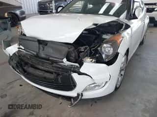 2014 Hyundai Veloster z VIN KMHTC6AD0EU193142, wystawiony jako IAAI lot #43464437 z przebiegiem 66 340 mil mil oraz . Historia ofert i sprzedaży dostępna na DreamBid. Obrazek 6.