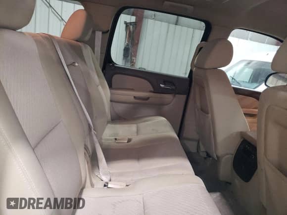 2011 Chevrolet Suburban LS with VIN 1GNSKHE33BR296058, listed as a Copart auction lot 42045125 with 218,708 mi miles and Salvage title. Bid and sale history available at DreamBid. Image 11.