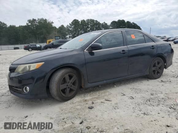 2012 Toyota Camry L с VIN 4T1BF1FK5CU100934, выставлен на аукционе Copart как лот 70927205 с пробегом 274 807 миль миль и Списание • Salvage title. История ставок и продаж доступна на DreamBid. Изображение 1.