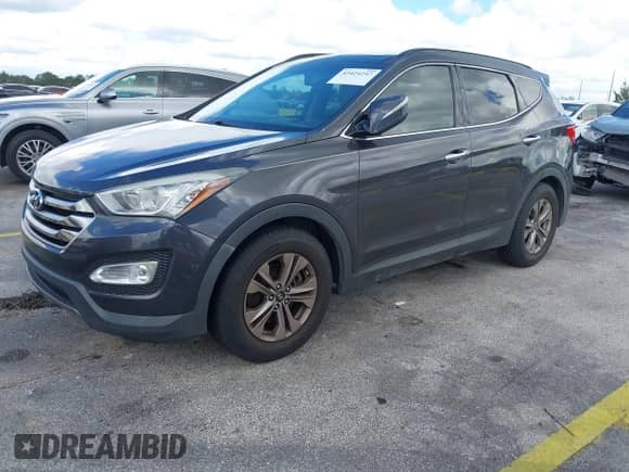 2016 Hyundai Santa Fe with VIN 5XYZUDLB6GG337079, listed as a IAAI auction lot 43424247 with Not provided miles and . Bid and sale history available at DreamBid. Image 2.