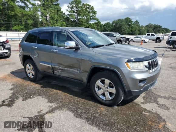 2012 Jeep Grand Cherokee Limited z VIN 1C4RJEBG7CC276299, wystawiony jako Copart lot #64085755 z przebiegiem 86 272 mil mil oraz Szkoda całkowita • Salvage title. Historia ofert i sprzedaży dostępna na DreamBid. Obrazek 4.