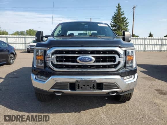 2021 Ford F-150 XL с VIN 1FTFW1E87MFA67419, выставлен на аукционе Copart как лот 69617145 с пробегом 45 028 миль миль и Списание • Salvage title. История ставок и продаж доступна на DreamBid. Изображение 5.