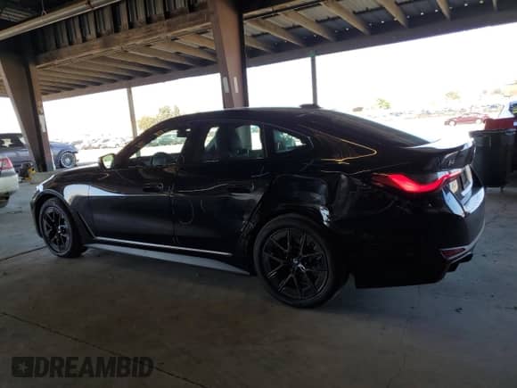 2023 BMW i4 eDrive35 с VIN WBY43AW04PFP97753, выставлен на аукционе Copart как лот 67144695 с пробегом 26 091 миль миль и Списание • Salvage title. История ставок и продаж доступна на DreamBid. Изображение 2.