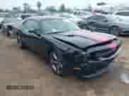 2013 Dodge Challenger SXT with VIN 2C3CDYAG1DH581784, listed as a IAAI auction lot 42263476 with 107,341 mi miles and . Bid and sale history available at DreamBid. Image 1.