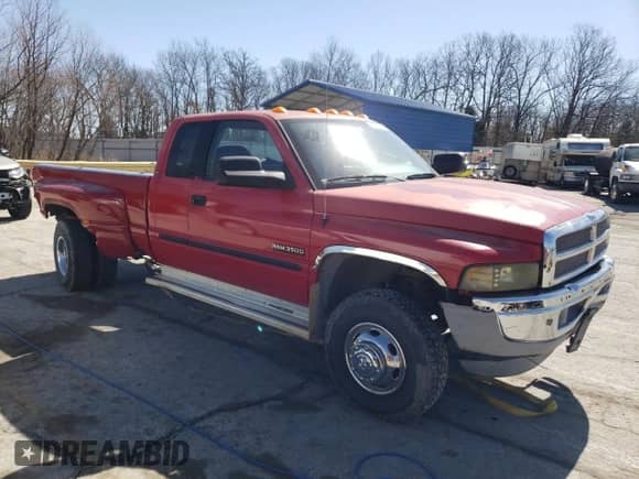 2002 Dodge 3500 z VIN 3B7MF33652M205850, wystawiony jako Copart lot #46422945 z przebiegiem 220 734 mil mil oraz Szkoda całkowita • Salvage title. Historia ofert i sprzedaży dostępna na DreamBid. Obrazek 4.