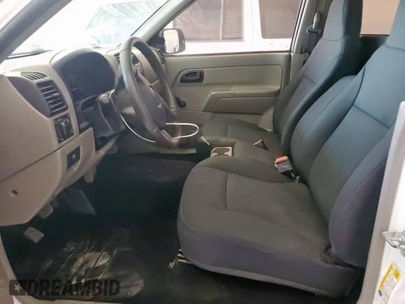 2006 Chevrolet Colorado Work Truck z VIN 1GCCS146468293066, wystawiony jako Copart lot #61366345 z przebiegiem 159 241 mil mil oraz Szkoda całkowita • Salvage title. Historia ofert i sprzedaży dostępna na DreamBid. Obrazek 7.