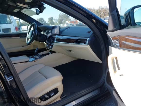 2019 BMW 5 Series 530i with VIN WBAJA5C58KWW09274, listed as a IAAI auction lot 43227065 with 97,443 mi miles and . Bid and sale history available at DreamBid. Image 5.