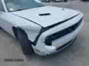 2021 Dodge Challenger SXT с VIN 2C3CDZGG2MH521669, выставлен на аукционе IAAI как лот 42202396 с пробегом 138 263 миль миль и . История ставок и продаж доступна на DreamBid. Изображение 6.