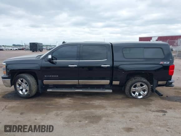 2014 Chevrolet Silverado 1500 LTZ with VIN 3GCUKSEC5EG301747, listed as a IAAI auction lot 42445832 with 169,483 mi miles and . Bid and sale history available at DreamBid. Image 14.