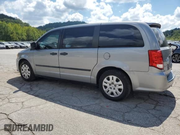 2014 Dodge Grand Caravan American Value with VIN 2C4RDGBG5ER101854, listed as a Copart auction lot 67929095 with 165,607 mi miles and Salvage title. Bid and sale history available at DreamBid. Image 2.