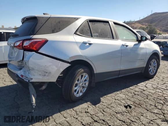 2021 Chevrolet Equinox LS z VIN 3GNAXHEVXMS141652, wystawiony jako Copart lot #71644165 z przebiegiem 77 388 mil mil oraz Szkoda całkowita • Salvage title. Historia ofert i sprzedaży dostępna na DreamBid. Obrazek 3.
