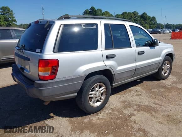 2004 Jeep Grand Cherokee Laredo with VIN 1J4GX48S54C401873, listed as a IAAI auction lot 43337181 with 274,149 mi miles and . Bid and sale history available at DreamBid. Image 4.