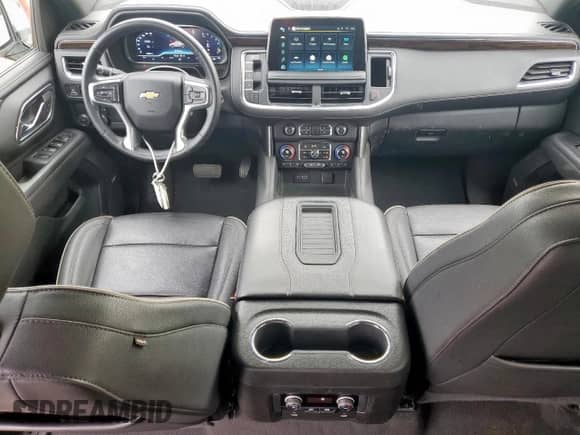 2023 Chevrolet Suburban Premier с VIN 1GNSCFKD7PR470834, выставлен на аукционе Copart как лот 84462395 с пробегом 52 720 миль миль и Списание • Salvage title. История ставок и продаж доступна на DreamBid. Изображение 8.