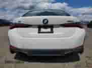 2024 BMW i4 eDrive35 with VIN WBY43AW03RFR59830, listed as a Copart auction lot 70283535 with 23,026 mi miles and Salvage title. Bid and sale history available at DreamBid. Image 6.