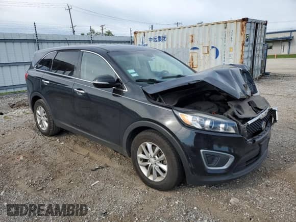 2016 Kia Sorento L with VIN 5XYPG4A38GG123396, listed as a Copart auction lot 70210415 with 176,920 mi miles and Salvage title. Bid and sale history available at DreamBid. Image 4.