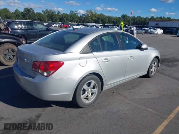 2014 Chevrolet Cruze 1LT with VIN 1G1PC5SB6E7387534, listed as a IAAI auction lot 43433757 with 132,459 mi miles and . Bid and sale history available at DreamBid. Image 4.