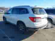 2021 Honda Pilot Touring 7-Passenger with VIN 5FNYF5H64MB031671, listed as a IAAI auction lot 41332415 with 90,411 mi miles and . Bid and sale history available at DreamBid. Image 3.