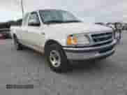 1997 Ford F-150 с VIN 1FTDX17W0VNB72214, выставлен на аукционе Copart как лот 87294095 с пробегом 309 147 миль миль и Чистый • Clean title. История ставок и продаж доступна на DreamBid. Изображение 4.