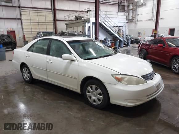 2002 Toyota Camry LE с VIN 4T1BE32K02U077095, выставлен на аукционе IAAI как лот 42405814 с пробегом 312 692 миль миль и . История ставок и продаж доступна на DreamBid. Изображение 1.