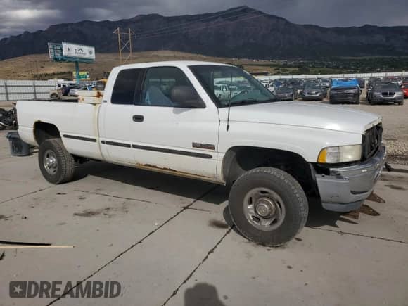 1998 Dodge 2500 with VIN 1B7KF2367WJ176999, listed as a Copart auction lot 81854595 with Not provided miles and Salvage title. Bid and sale history available at DreamBid. Image 4.