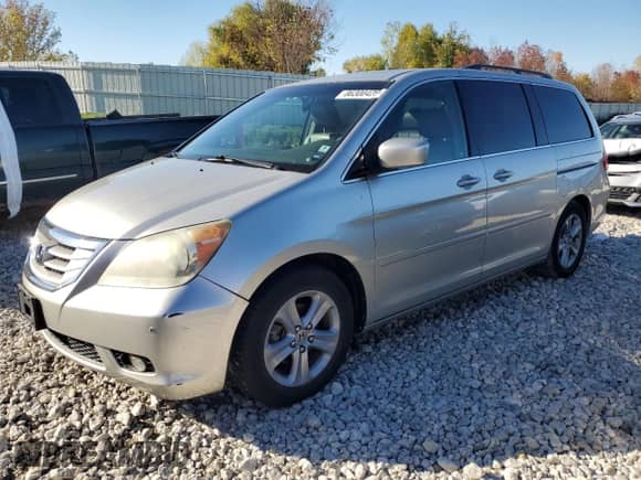 2008 Honda Odyssey Touring с VIN 5FNRL38938B101632, выставлен на аукционе Copart как лот 86300425 с пробегом 166 020 миль миль и Чистый • Clean title. История ставок и продаж доступна на DreamBid. Изображение 1.