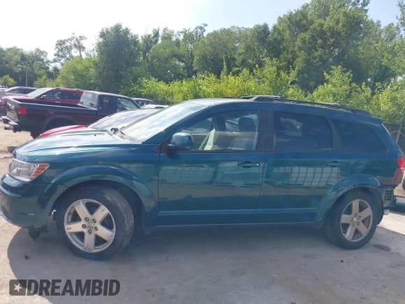 2009 Dodge Journey SXT with VIN 3D4GG57V59T223498, listed as a IAAI auction lot 42648585 with 187,142 mi miles and . Bid and sale history available at DreamBid. Image 15.