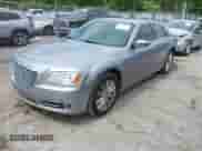 2014 Chrysler 300 with VIN 2C3CCARG7EH163424, listed as a IAAI auction lot 42596216 with 132,943 mi miles and . Bid and sale history available at DreamBid. Image 18.