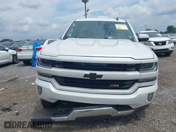 2016 Chevrolet Silverado 1500 LT with VIN 3GCUKREC4GG363667, listed as a IAAI auction lot 42617337 with 149,385 mi miles and . Bid and sale history available at DreamBid. Image 12.