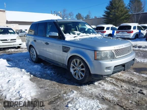 2011 Land Rover Range Rover Sport SC z VIN SALSH2E4XBA274563, wystawiony jako IAAI lot #41614852 z przebiegiem 114 586 mil mil oraz . Historia ofert i sprzedaży dostępna na DreamBid. Obrazek 1.