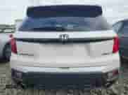 2025 Honda Passport EX-L with VIN 5FNYF8H50SB012847, listed as a Copart auction lot 65118915 with 19,238 mi miles and Salvage title. Bid and sale history available at DreamBid. Image 6.