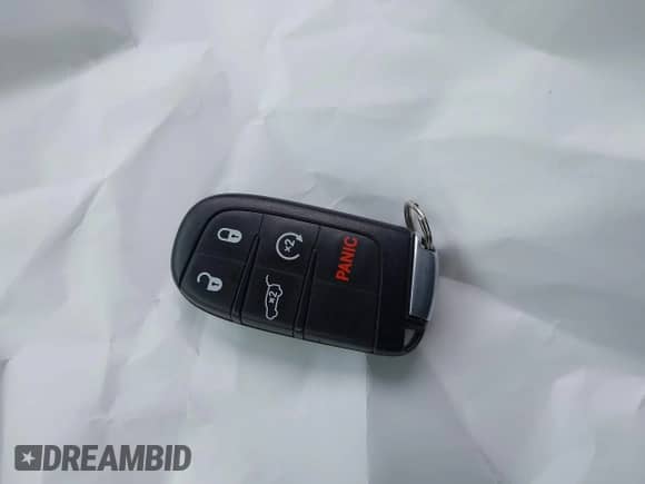 2020 Jeep Grand Cherokee Laredo E with VIN 1C4RJFAG7LC427620, listed as a IAAI auction lot 42403254 with 34,414 mi miles and . Bid and sale history available at DreamBid. Image 11.