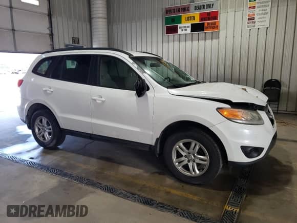 2012 Hyundai Santa Fe GLS с VIN 5XYZGDAB8CG155498, выставлен на аукционе Copart как лот 66804925 с пробегом 145 729 миль миль и Списание • Salvage title. История ставок и продаж доступна на DreamBid. Изображение 4.