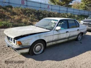 1993 BMW 7 Series with VIN WBAGD832XPDE85801, listed as a Copart auction lot 77111624 with 163,143 mi miles and Clean title. Bid and sale history available at DreamBid. Image 1.