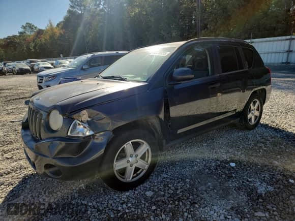 2007 Jeep Compass Sport с VIN 1J8FT47W47D221924, выставлен на аукционе Copart как лот 86438895 с пробегом 200 924 миль миль и Списание • Salvage title. История ставок и продаж доступна на DreamBid. Изображение 1.