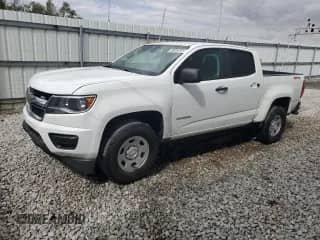 2020 Chevrolet Colorado 4WD Work Truck с VIN 1GCGTBEN5L1184873, выставлен на аукционе Copart как лот 81303685 с пробегом 112 691 миль миль и Чистый • Clean title. История ставок и продаж доступна на DreamBid. Изображение 1.