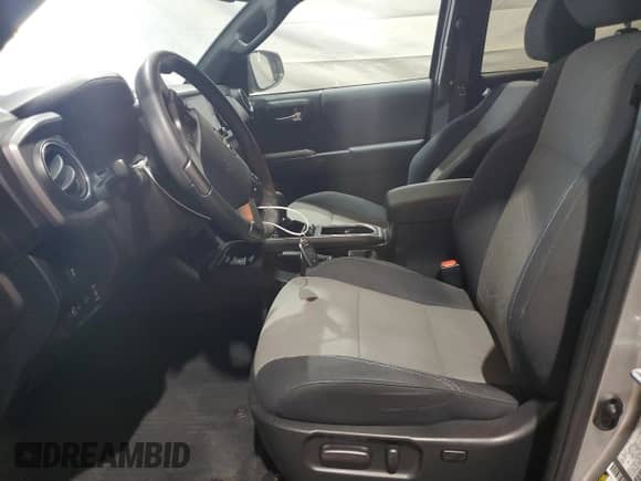 2022 Toyota Tacoma SR с VIN 3TMCZ5AN9NM491585, выставлен на аукционе Copart как лот 70081925 с пробегом 49 254 миль миль и Списание • Salvage title. История ставок и продаж доступна на DreamBid. Изображение 7.