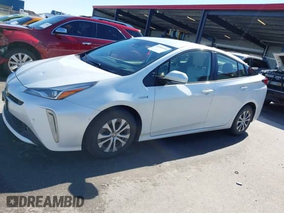 2021 Toyota Prius LE with VIN JTDL9MFU8M3029027, listed as a IAAI auction lot 43354130 with 66,497 mi miles and . Bid and sale history available at DreamBid. Image 14.