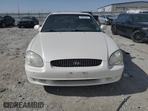2001 Hyundai Sonata GLS z VIN KMHWF35V91A466774, wystawiony jako Copart lot #48985565 z przebiegiem 98 648 mil mil oraz Czysty tytuł • Clean title. Historia ofert i sprzedaży dostępna na DreamBid. Obrazek 5.