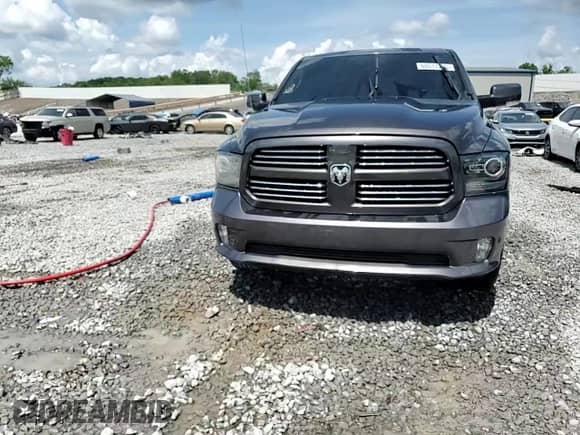 2014 Ram 1500 Sport z VIN 1C6RR6MT5ES229894, wystawiony jako Copart lot #60517795 z przebiegiem 162 279 mil mil oraz Szkoda całkowita • Salvage title. Historia ofert i sprzedaży dostępna na DreamBid. Obrazek 13.