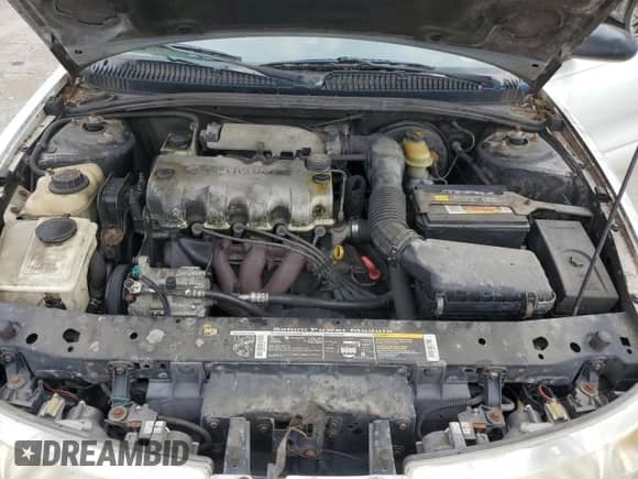 1997 Saturn SC with VIN 1G8ZF1282VZ133256, listed as a Copart auction lot 74026354 with 84,564 mi miles and Salvage title. Bid and sale history available at DreamBid. Image 11.