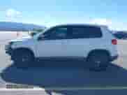 2014 Volkswagen Tiguan S with VIN WVGAV3AX0EW554013, listed as a IAAI auction lot 43426029 with 122,127 mi miles and . Bid and sale history available at DreamBid. Image 15.