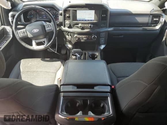 2021 Ford F-150 XL z VIN 1FTEX1EP4MKE97657, wystawiony jako Copart lot #84257035 z przebiegiem 33 163 mil mil oraz Szkoda całkowita • Salvage title. Historia ofert i sprzedaży dostępna na DreamBid. Obrazek 8.