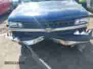 2002 Chevrolet Silverado 1500 LS z VIN 2GCEC19T921276930, wystawiony jako IAAI lot #42705421 z przebiegiem 262 998 mil mil oraz . Historia ofert i sprzedaży dostępna na DreamBid. Obrazek 6.