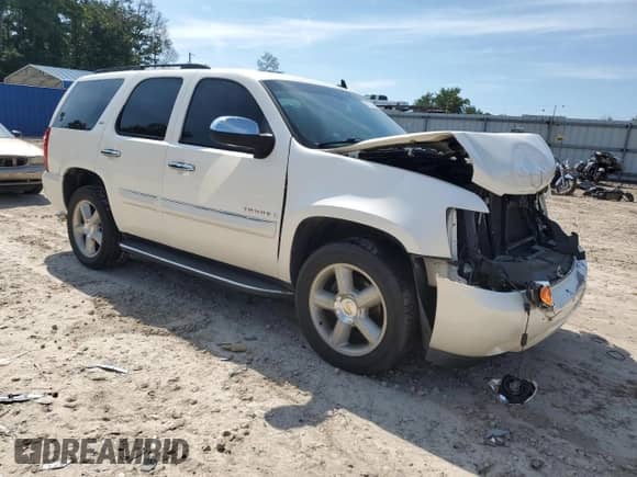 2008 Chevrolet Tahoe LTZ с VIN 1GNFC13J98R217332, выставлен на аукционе Copart как лот 70231695 с пробегом 201 502 миль миль и Списание • Salvage title. История ставок и продаж доступна на DreamBid. Изображение 4.