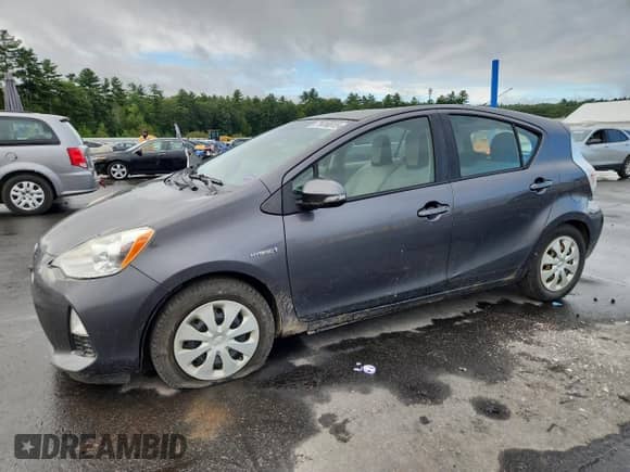 2012 Toyota Prius One with VIN JTDKDTB38C1505174, listed as a Copart auction lot 71418815 with 297,747 mi miles and Clean title. Bid and sale history available at DreamBid. Image 1.