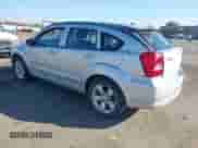 2010 Dodge Caliber SXT with VIN 1B3CB4HA4AD661148, listed as a IAAI auction lot 43507699 with 186,140 mi miles and . Bid and sale history available at DreamBid. Image 3.