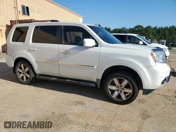 2014 Honda Pilot Touring with VIN 5FNYF3H96EB001670, listed as a Copart auction lot 70638295 with 163,468 mi miles and Salvage title. Bid and sale history available at DreamBid. Image 4.
